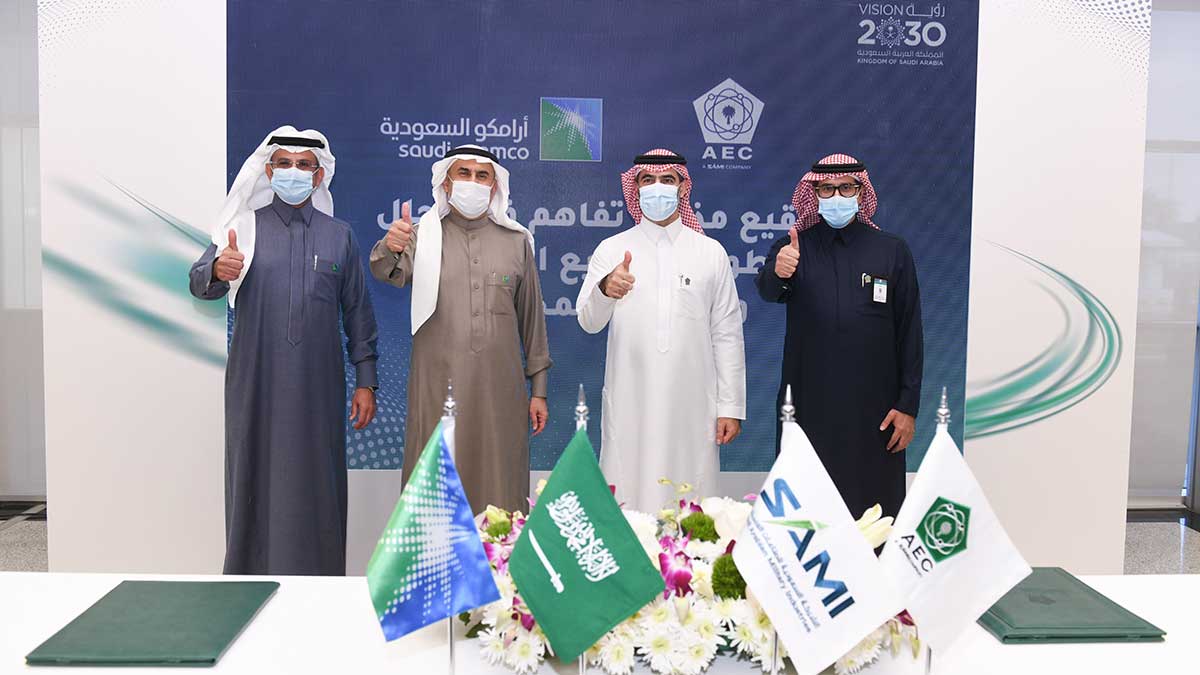 Nabeel alnaem and ahmed alsade with waleed abu khaled and ziyad almusalim at MOU ceremony