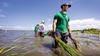 Volunteers wade into water to restore Galveston Bay