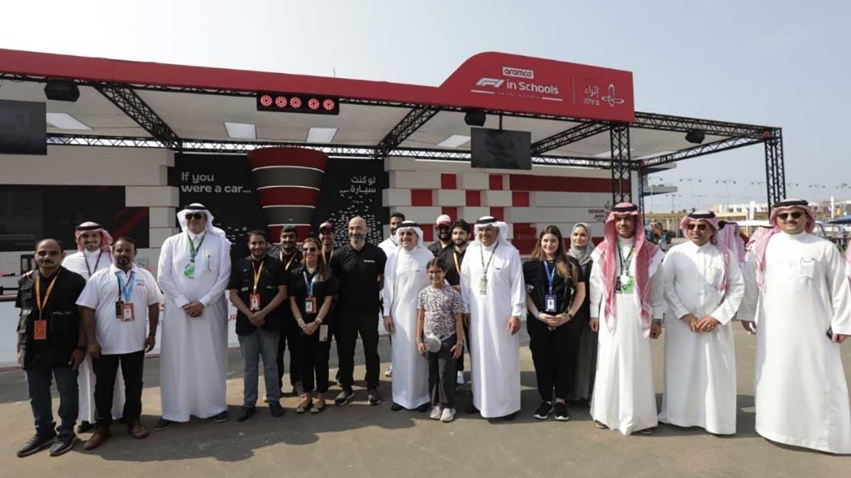 Aramco president and CEO Amin Nasser and other Aramco officials visit the F1 in Schools exhibit at the Saudi Arabian Grand Prix