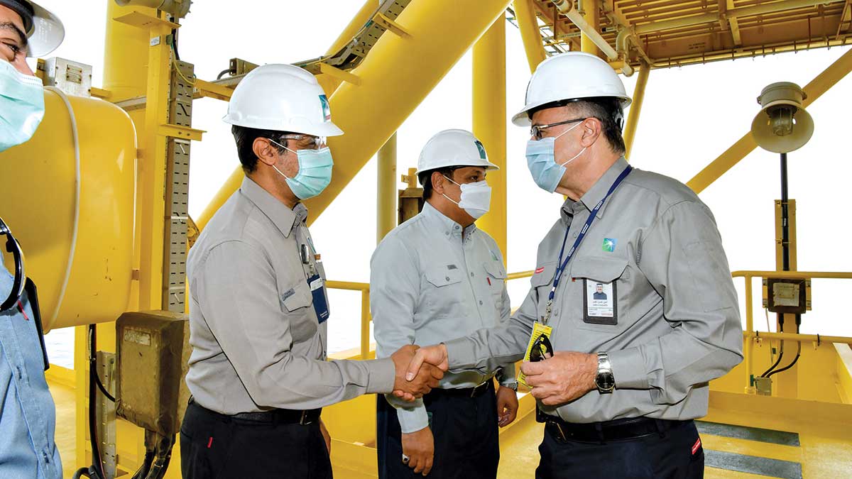 Aramco CEO Amin Nasser greets employees aboard a rig in the Arabian Gulf during his Ramadan Tour