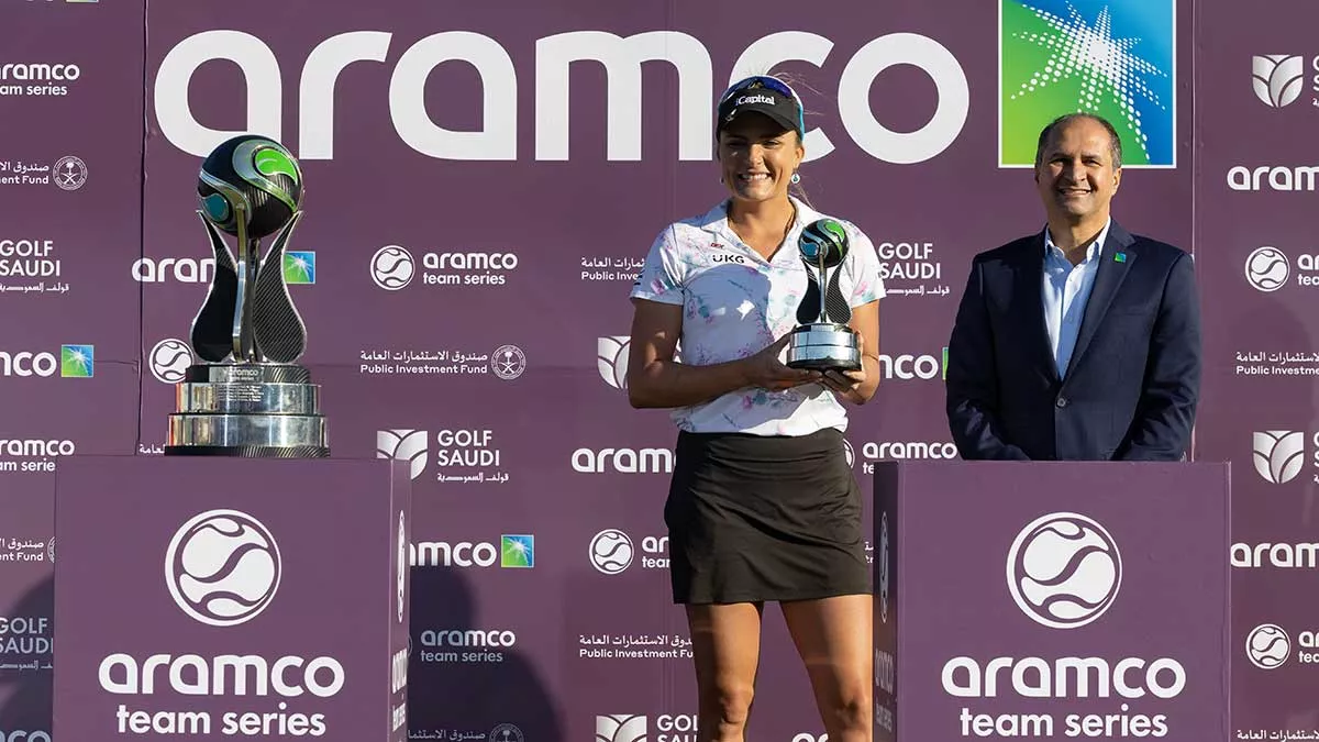 Aramco Team Series champion Lexi Thompson and Aramco's Ibrahim Q. Al-Buainain