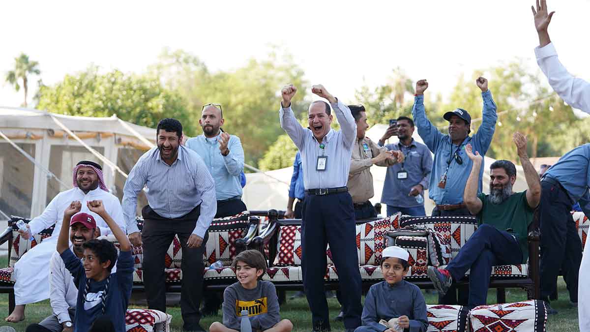 Abqaiq fans celebrate in the Fan Zone
