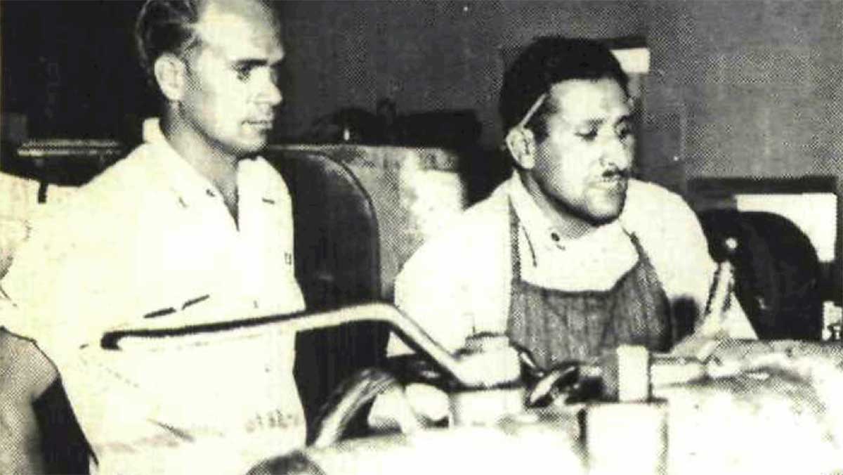 1956 Aramco machine operator watches progress on a drilling equipment job