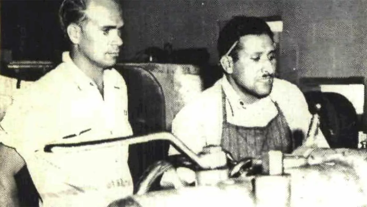 1956 Aramco machine operator watches progress on a drilling equipment job