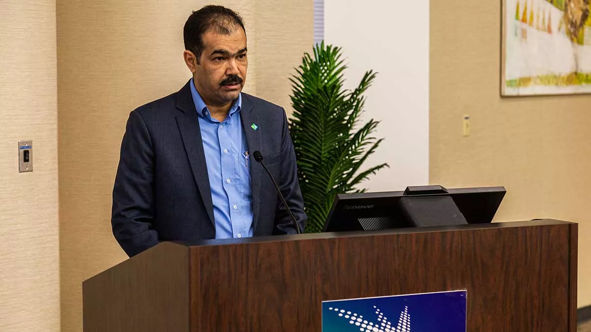Aramco's Gas Drilling and Workover Department director Naser Otaibi speaks at recognition ceremony
