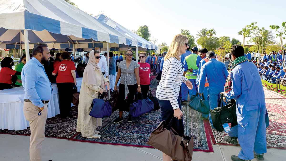 Gardening and Sanitation workers in Dhahran receive Ramadan gift duffels from charity