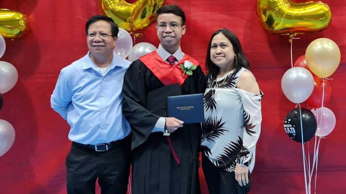 Longtime Aramco employee Rey Mercado and his family at his son's ninth grade graduation in Abqaiq