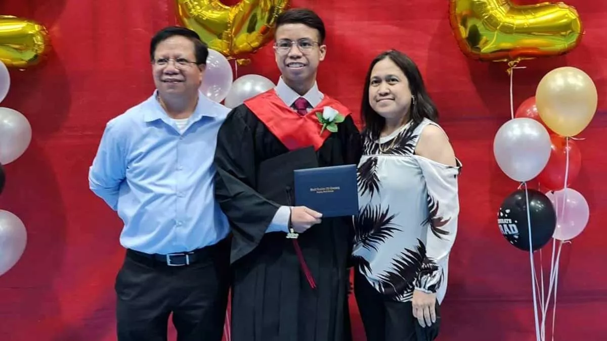 Longtime Aramco employee Rey Mercado and his family at his son's ninth grade graduation in Abqaiq