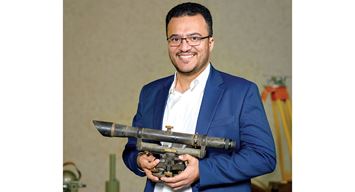 Abdulaziz I. Mugaiteeb helps arrange transfer of surveying tools toward Archive efforts