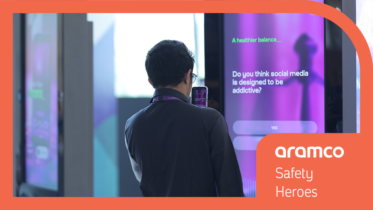 scanning the QR code in Ithra lobby during Sync 2024