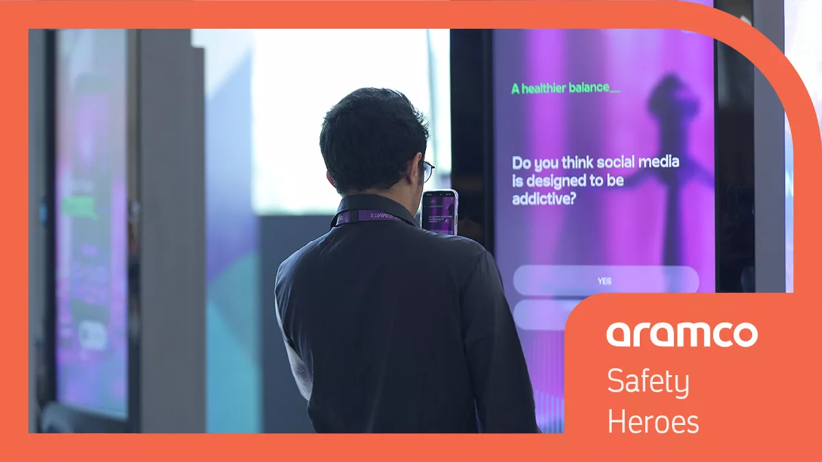 scanning the QR code in Ithra lobby during Sync 2024