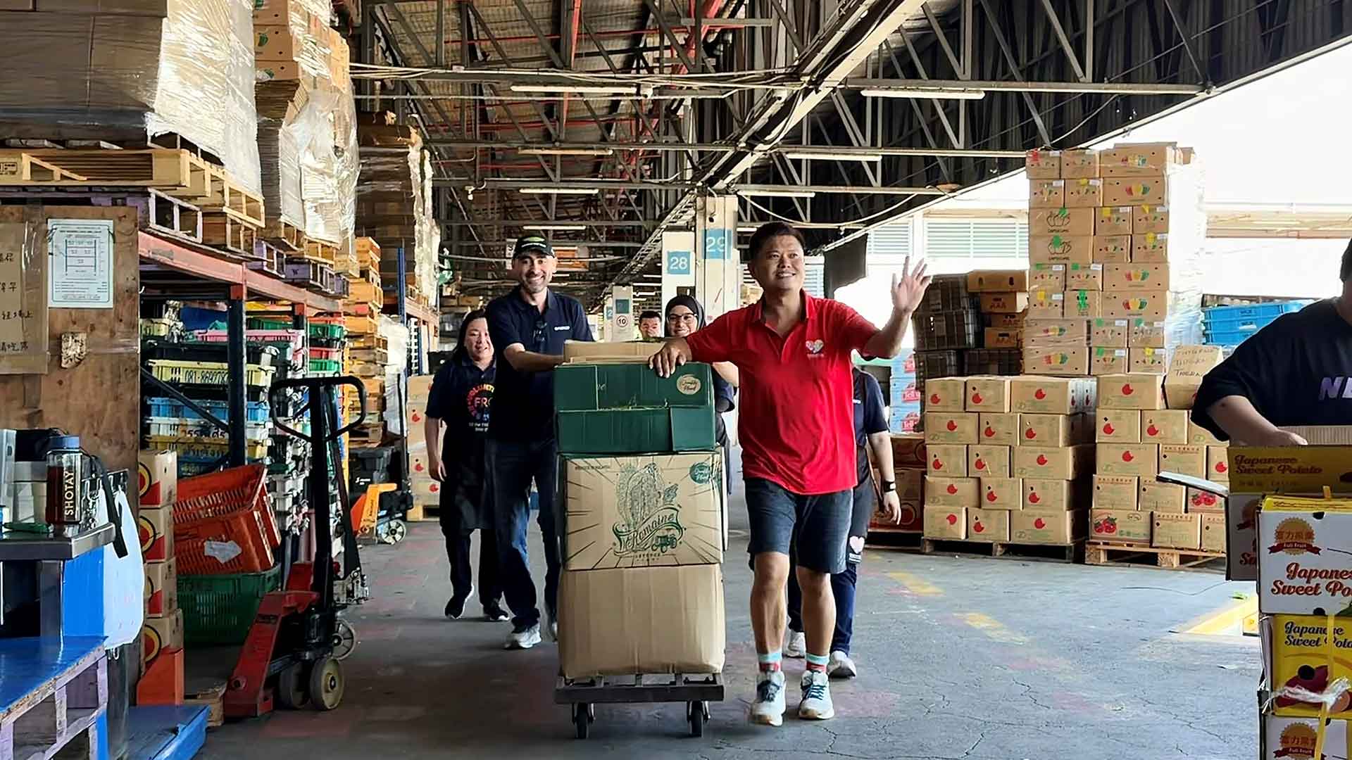Aramco Asia Singapore employees volunteer with Fridge Restock Community to help reduce food wastage