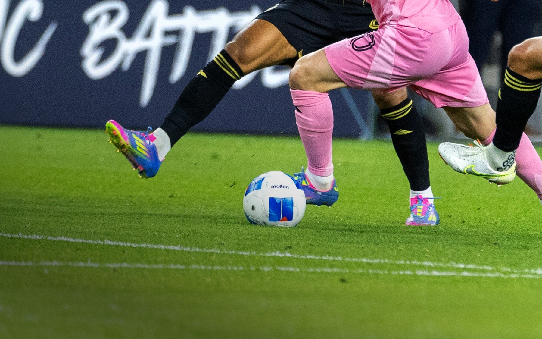 Football players dribbling the football in Concacaf